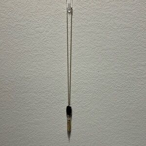 Kendra Scott necklace.